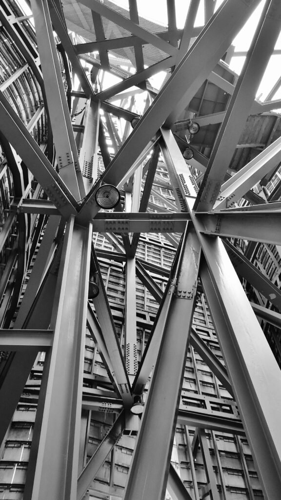 architecture-iron-steel-building-53176-53176 A detailed view of a complex steel framework showcasing modern industrial architecture.